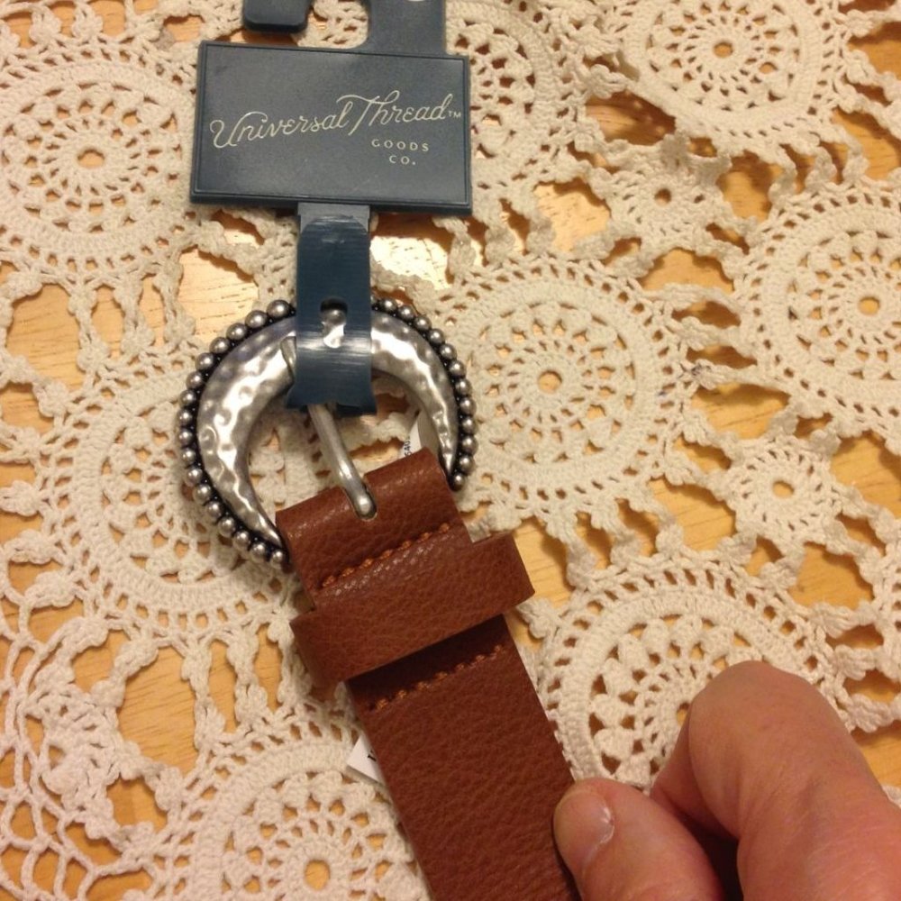 Brown faux leather belt with hand-hammered look buckle